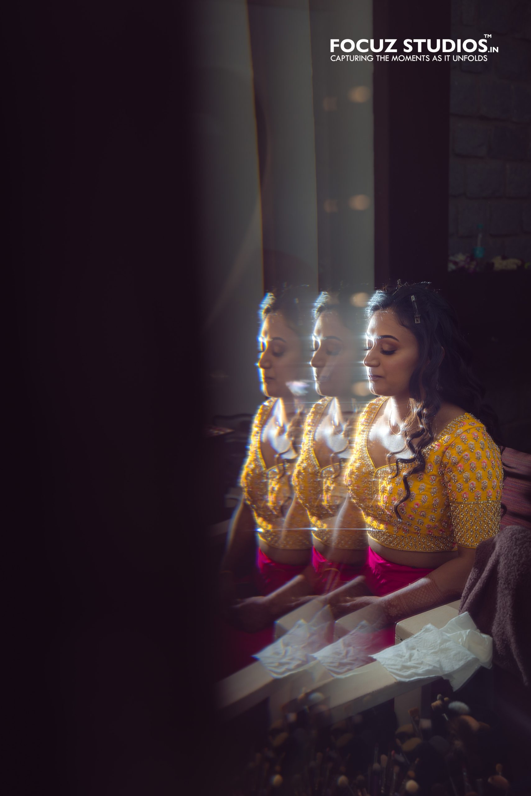 Creative bridal preparation portrait before Sangeet celebration