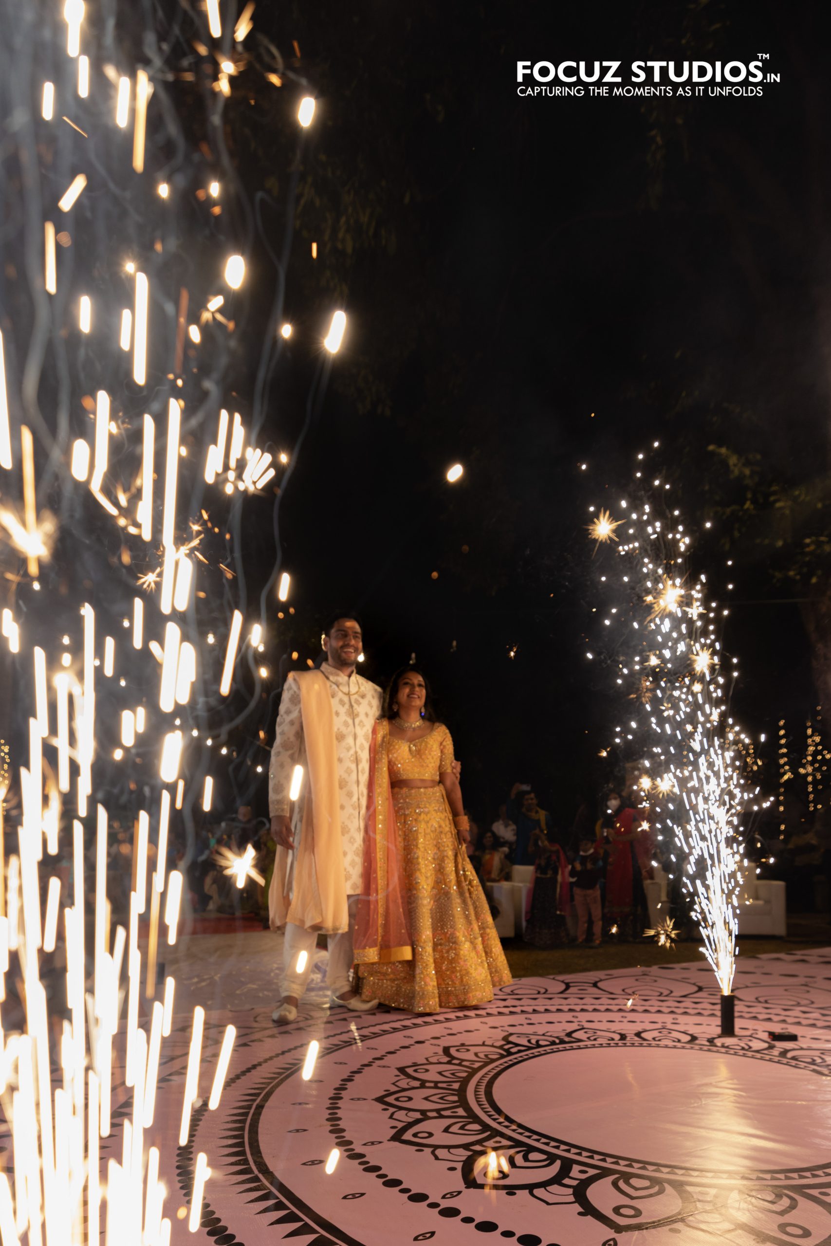 Grand sparkler entrance during Nikita and Pranav Sangeet