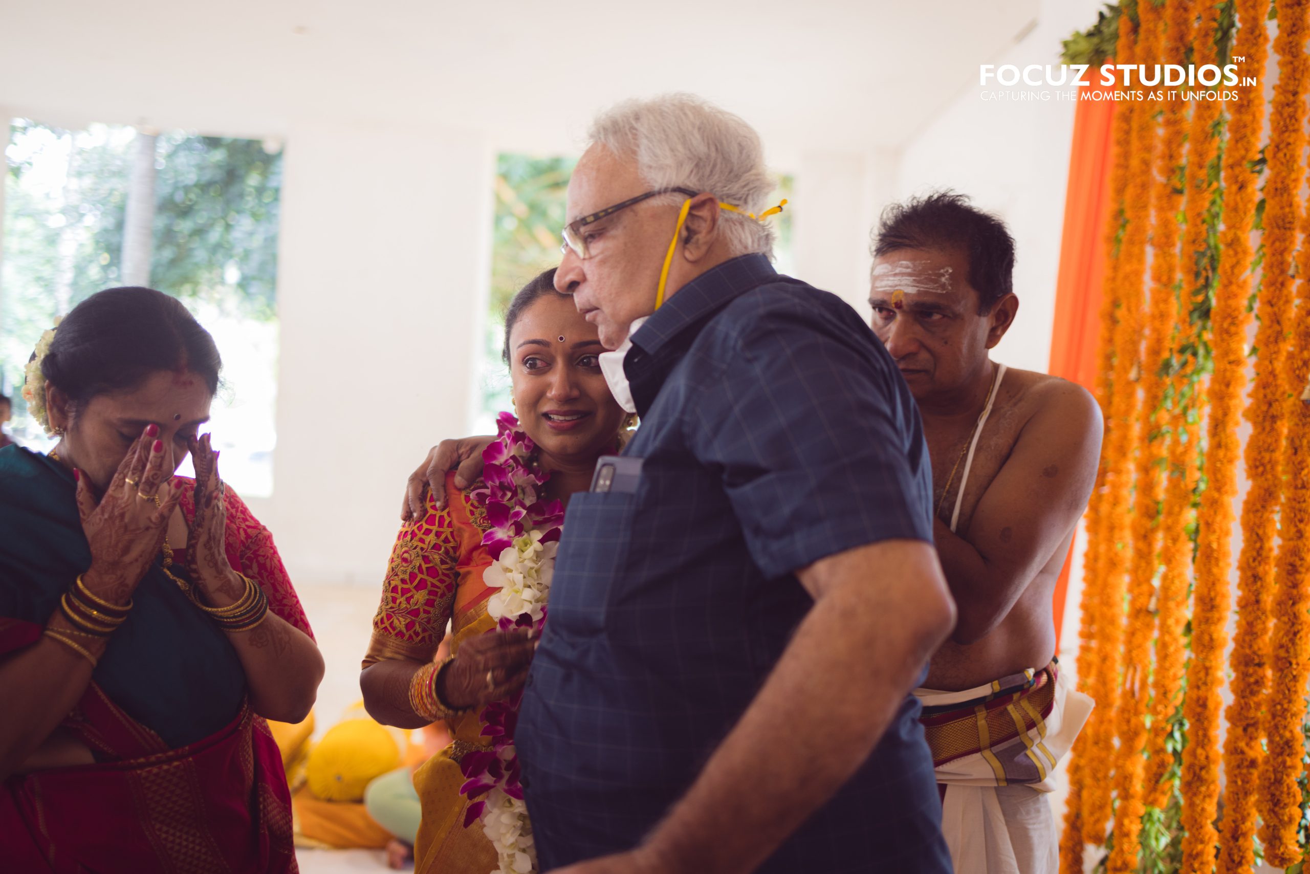 Emotional moment during Nikitha Pranav Vratham photography