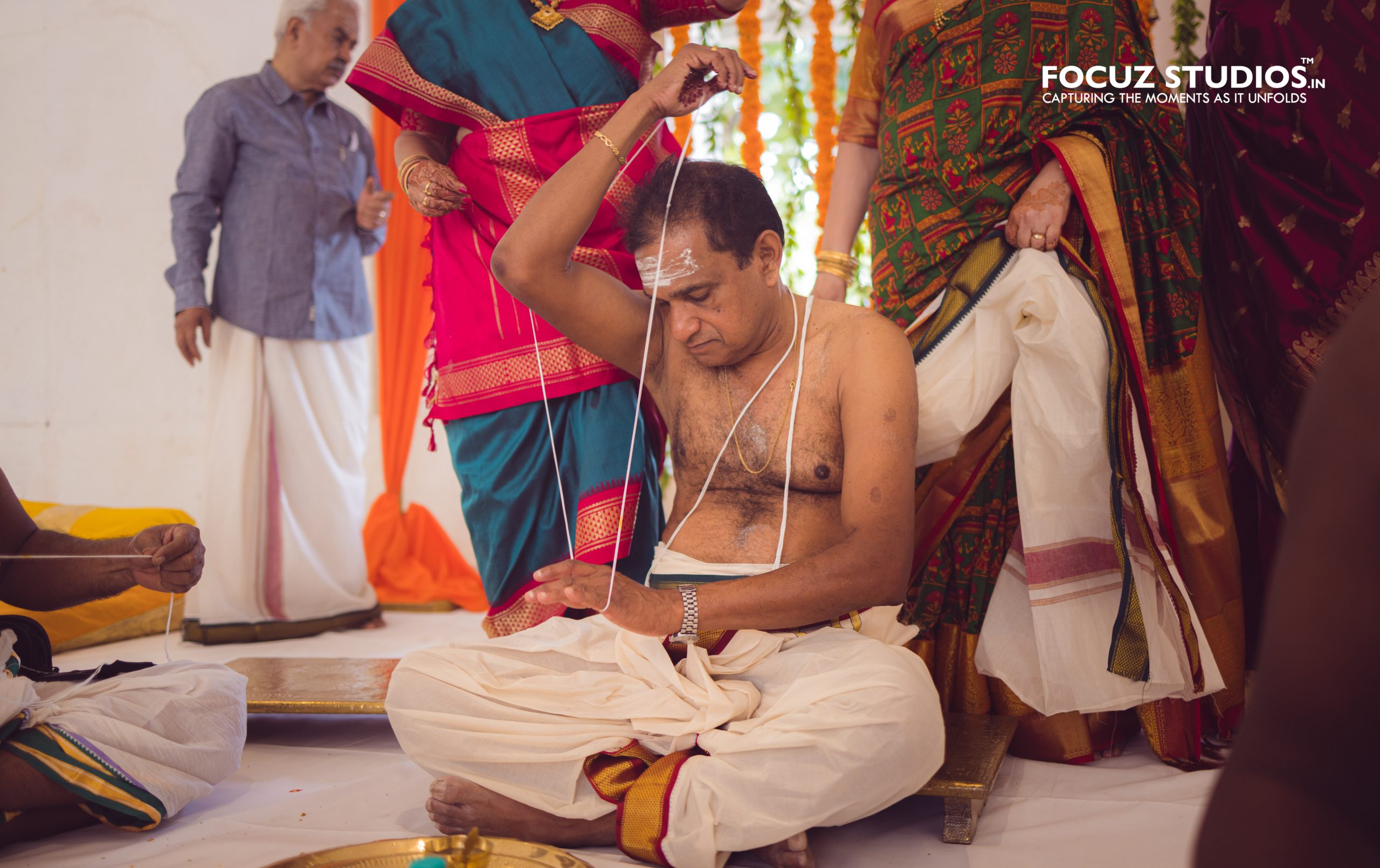Father performing a sacred family ritual