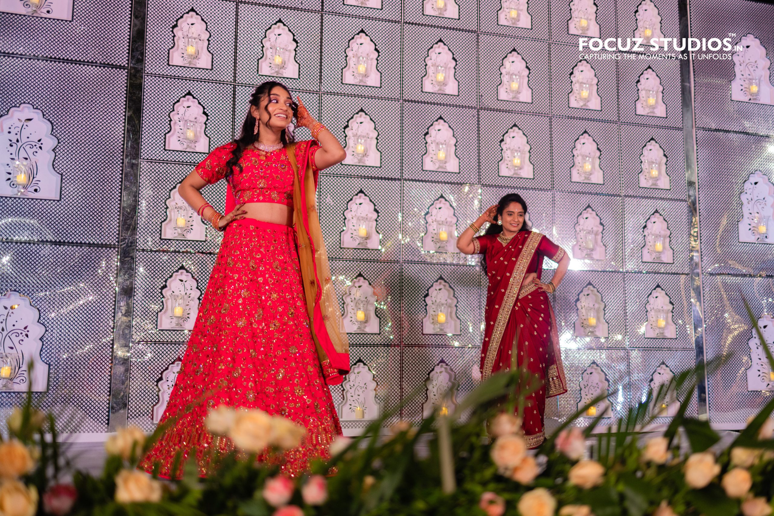 Nikita dancing on stage during Chennai Sangeet celebration